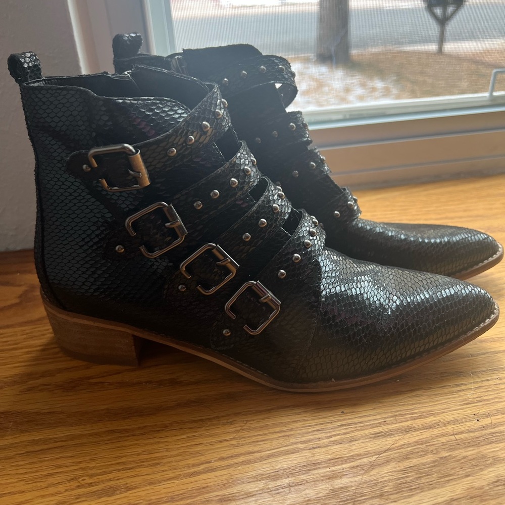 Black booties with buckles. Used but in good condition! Size 9